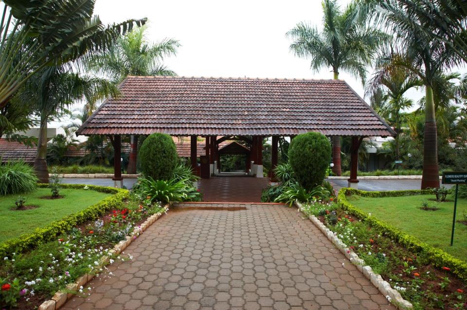 Lush green pathway at Gateway Chikmagalur