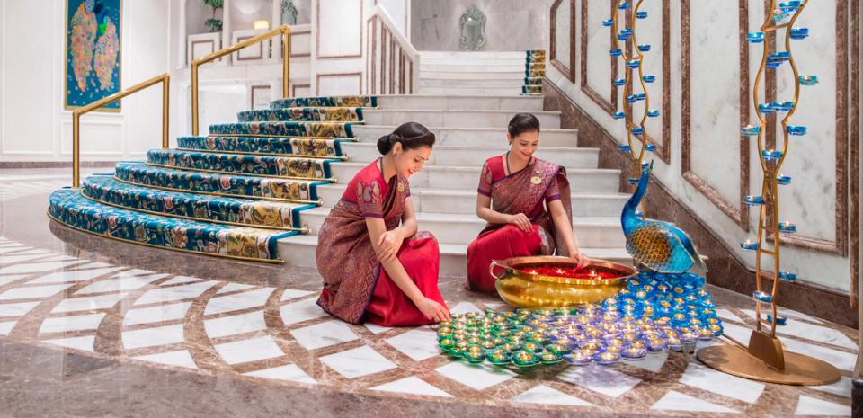 Taj Staff Lighting Diyas For A Warm Welcome To Guests