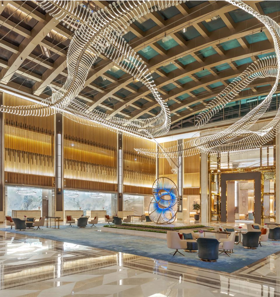 Lobby Chandelier Curving Around Ceiling - Taj Exotica, Dubai