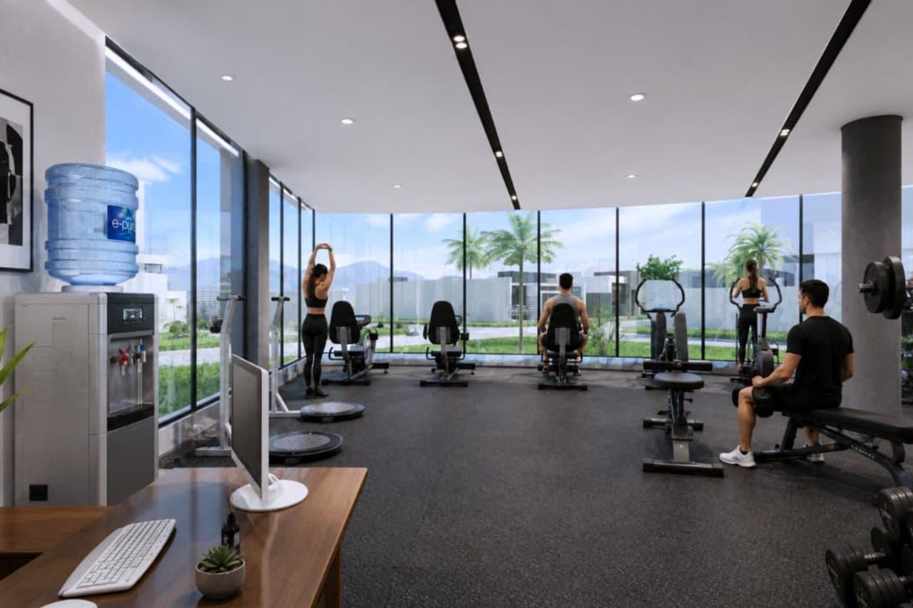 Recepción del gimnasio y zona de cardio