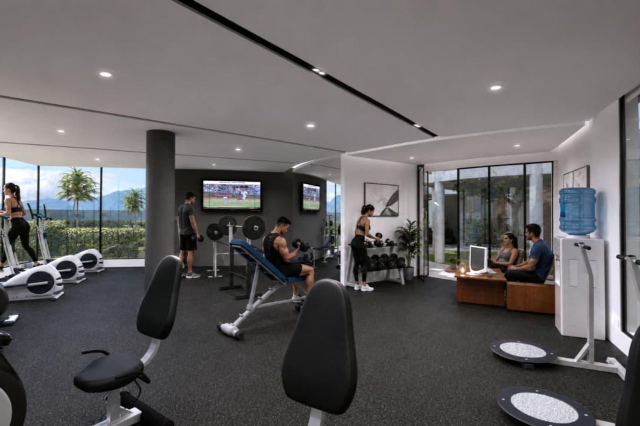 Área de pesas y descanso del gimnasio