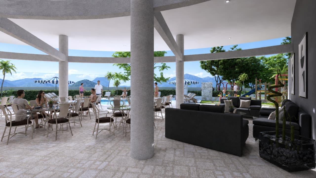 Terraza social con sofás y vista a la piscina