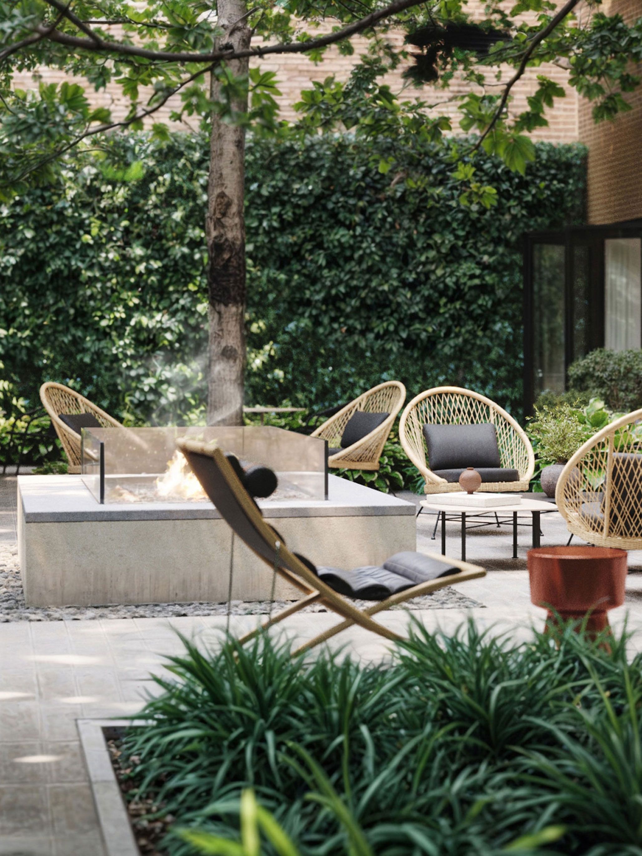 seating and fireplace in outdoor courtyard