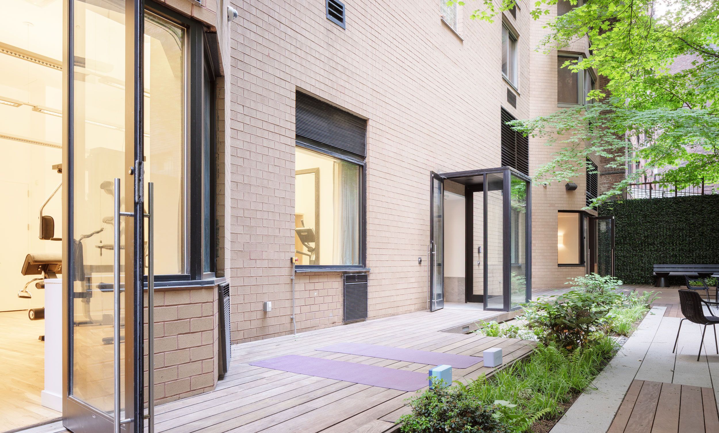 outdoor yoga deck in courtyard
