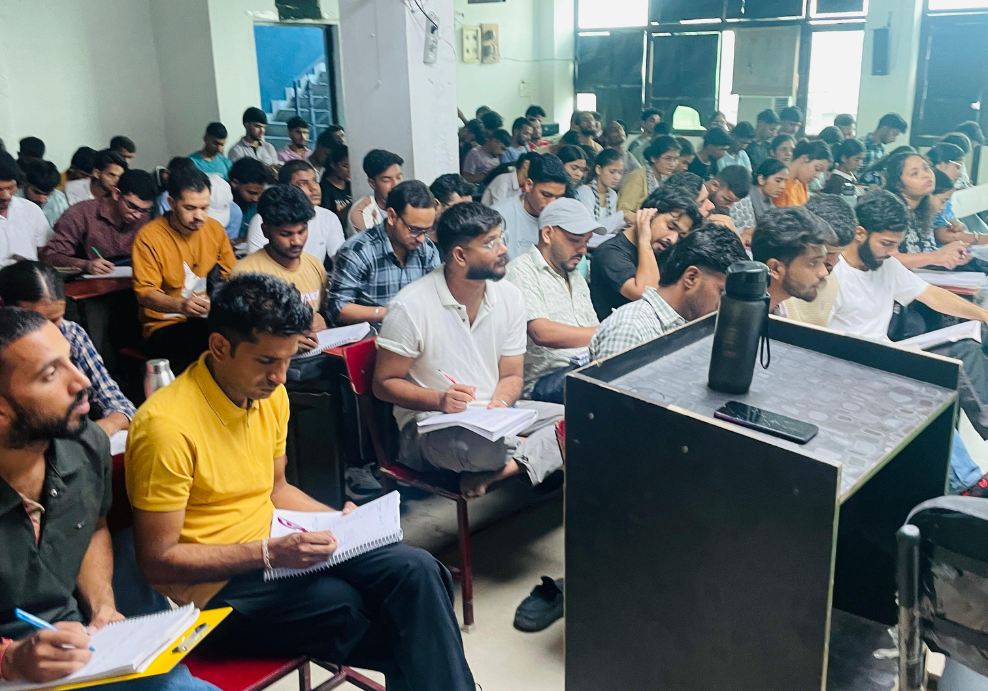 Students studying together at AIM Campus