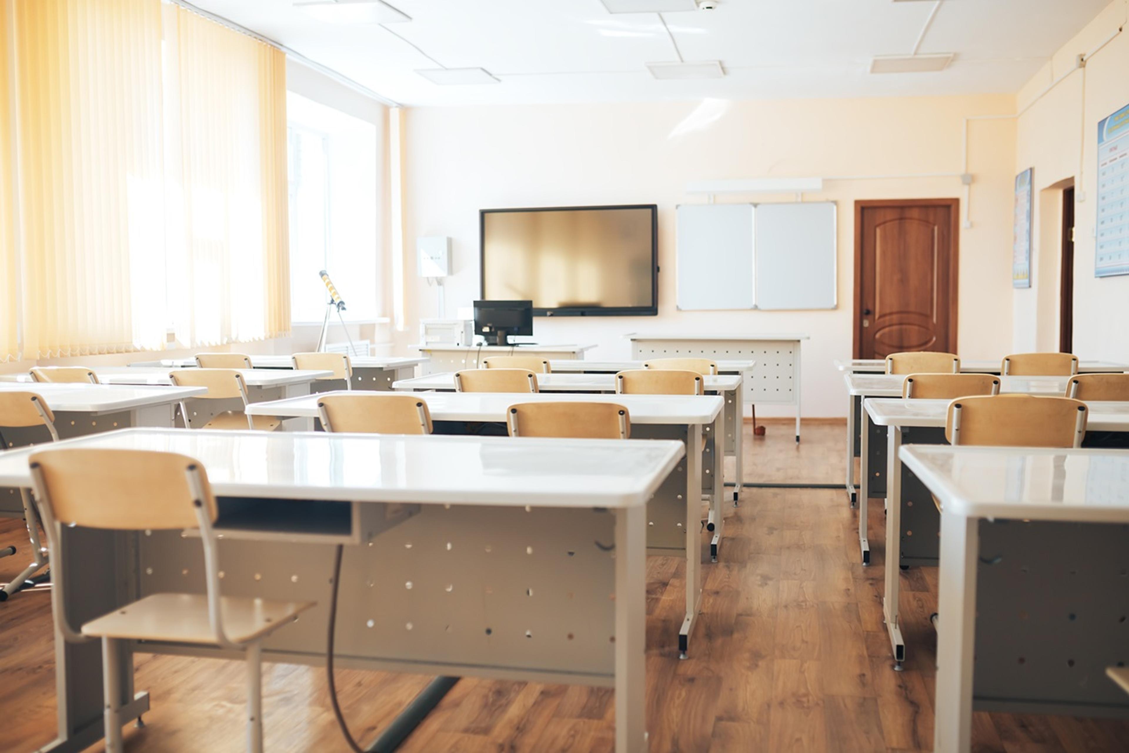 An empty classroom set up for an exam