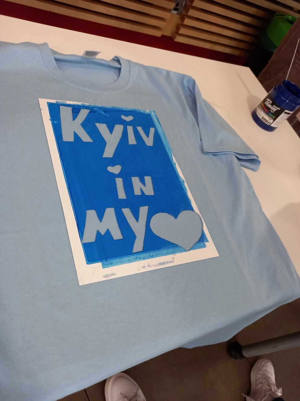 Image of a tshirt being screen printed