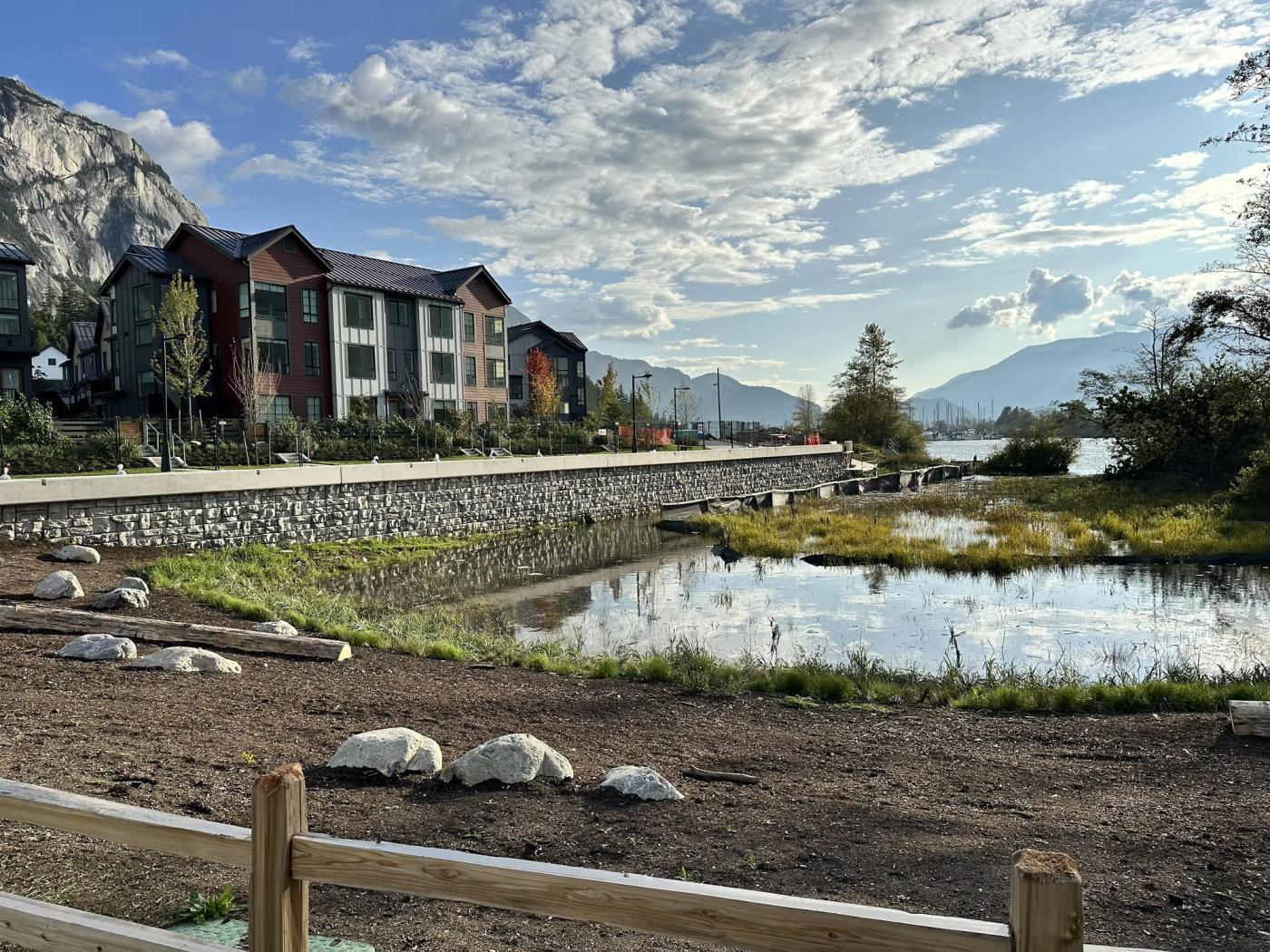 Waterfront housing and a rip-rap bank on the Squamish estuary, below the Chief