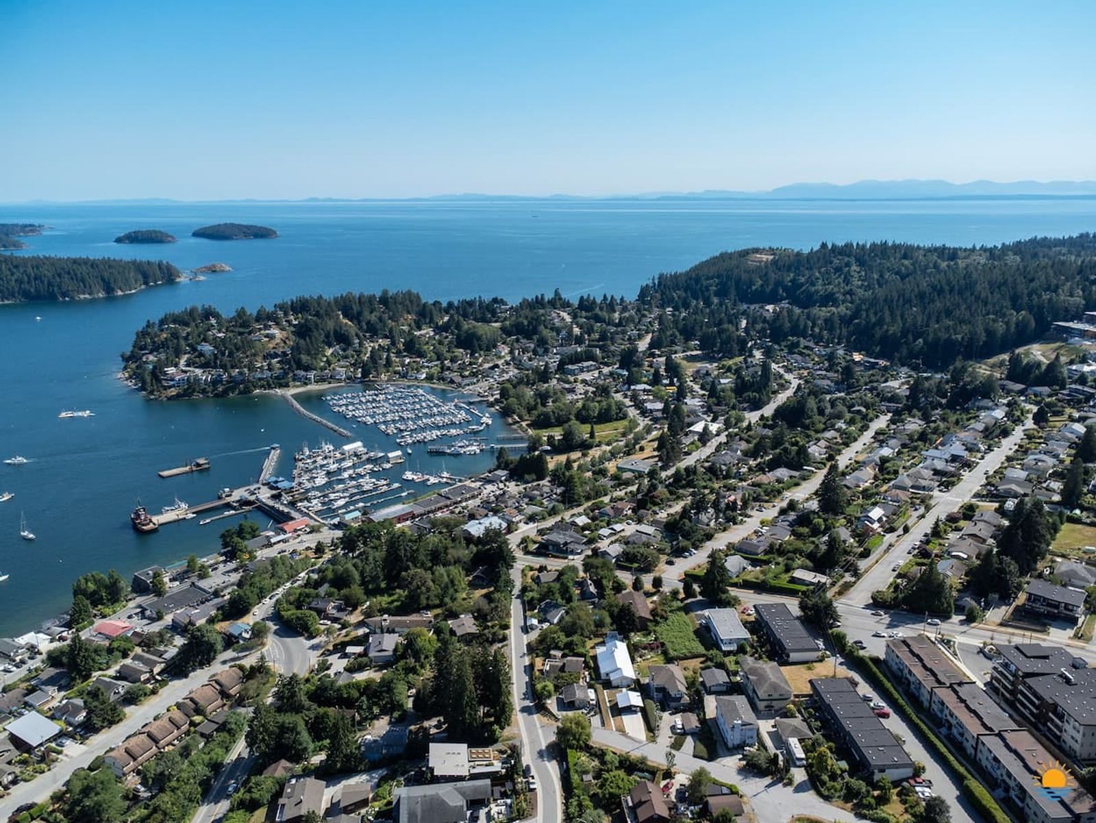 Aerial of Gibsons harbour and the town above it