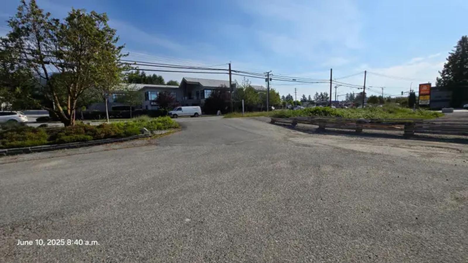 The gravel lot at Gibsons Way before the work
