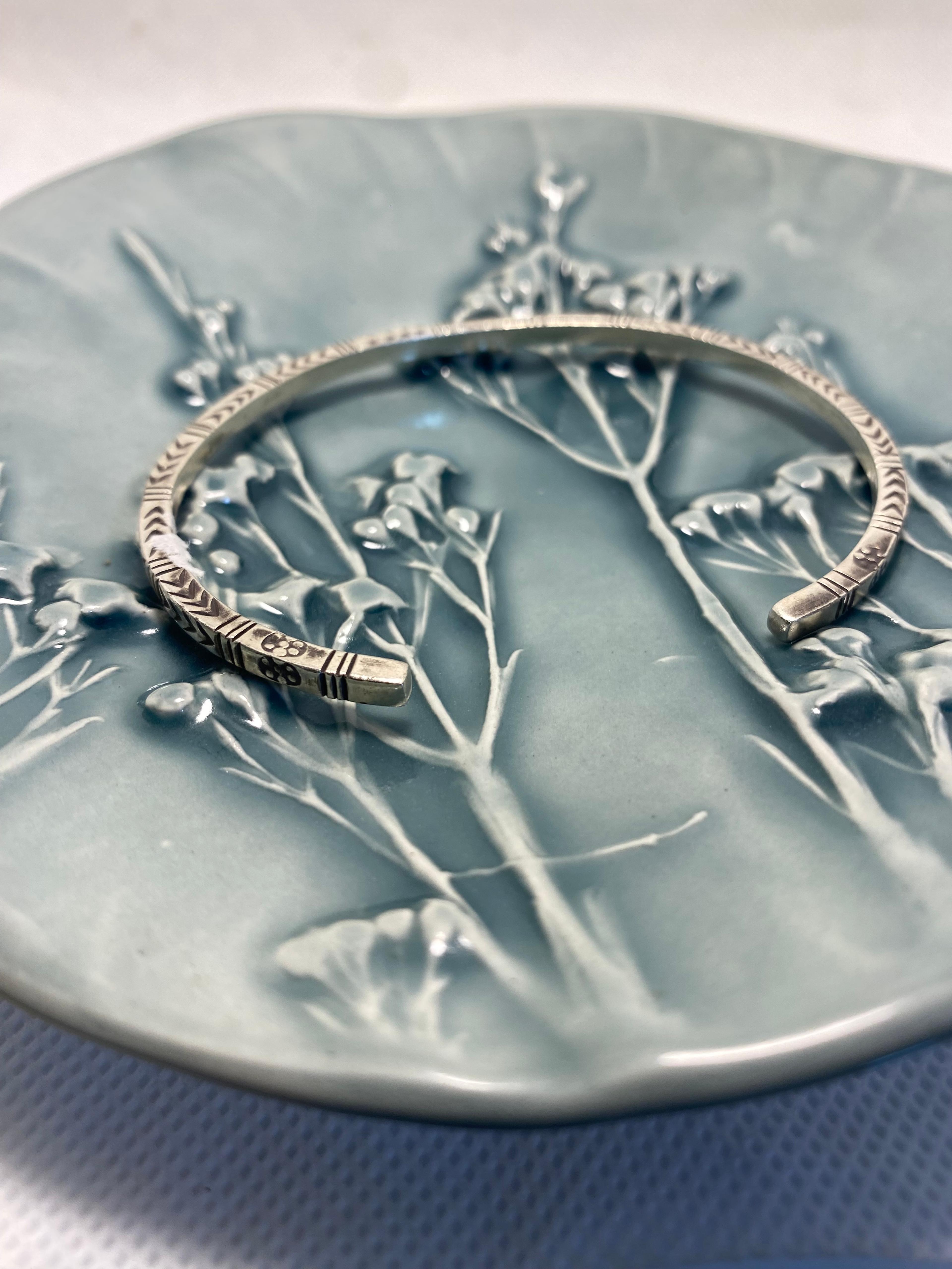 Punched tribal Bangle