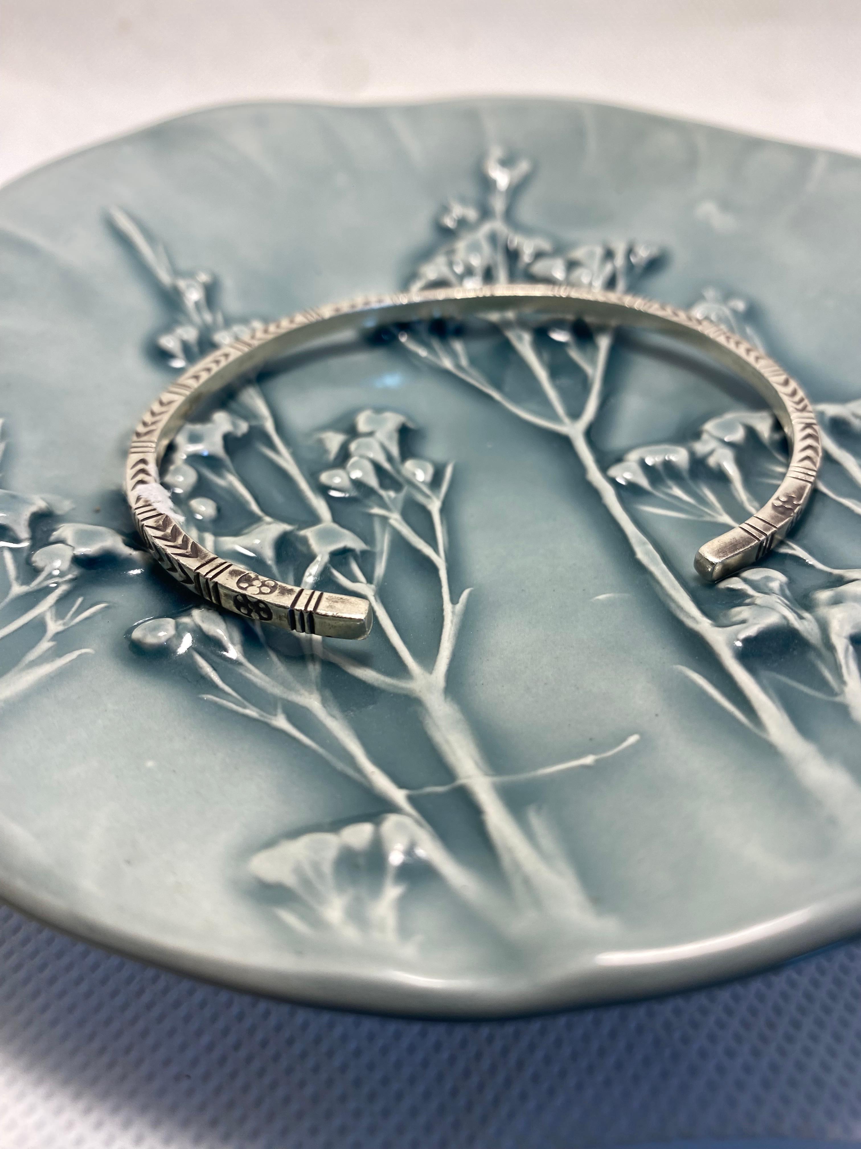 Punched tribal Bangle