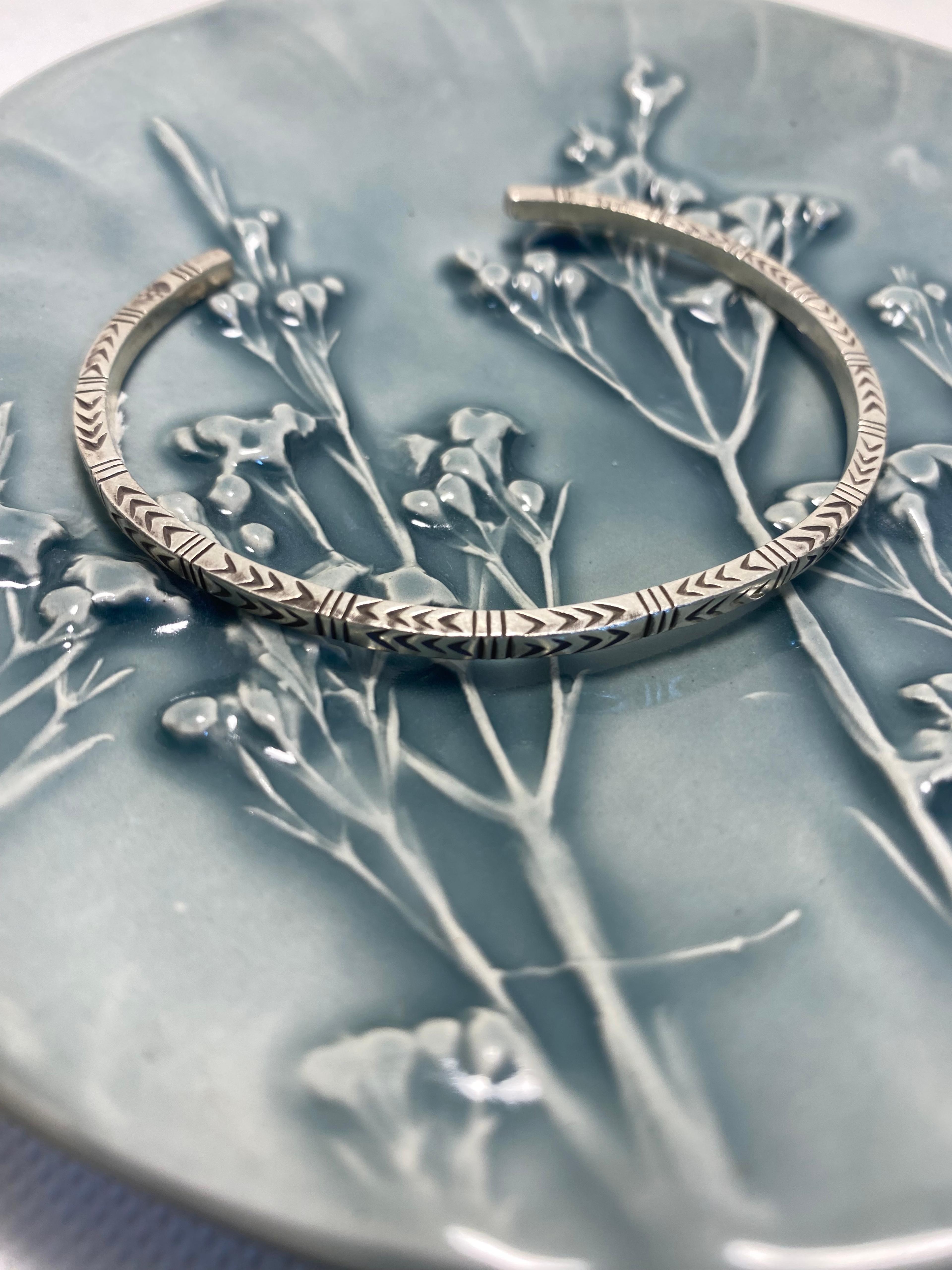 Punched tribal Bangle