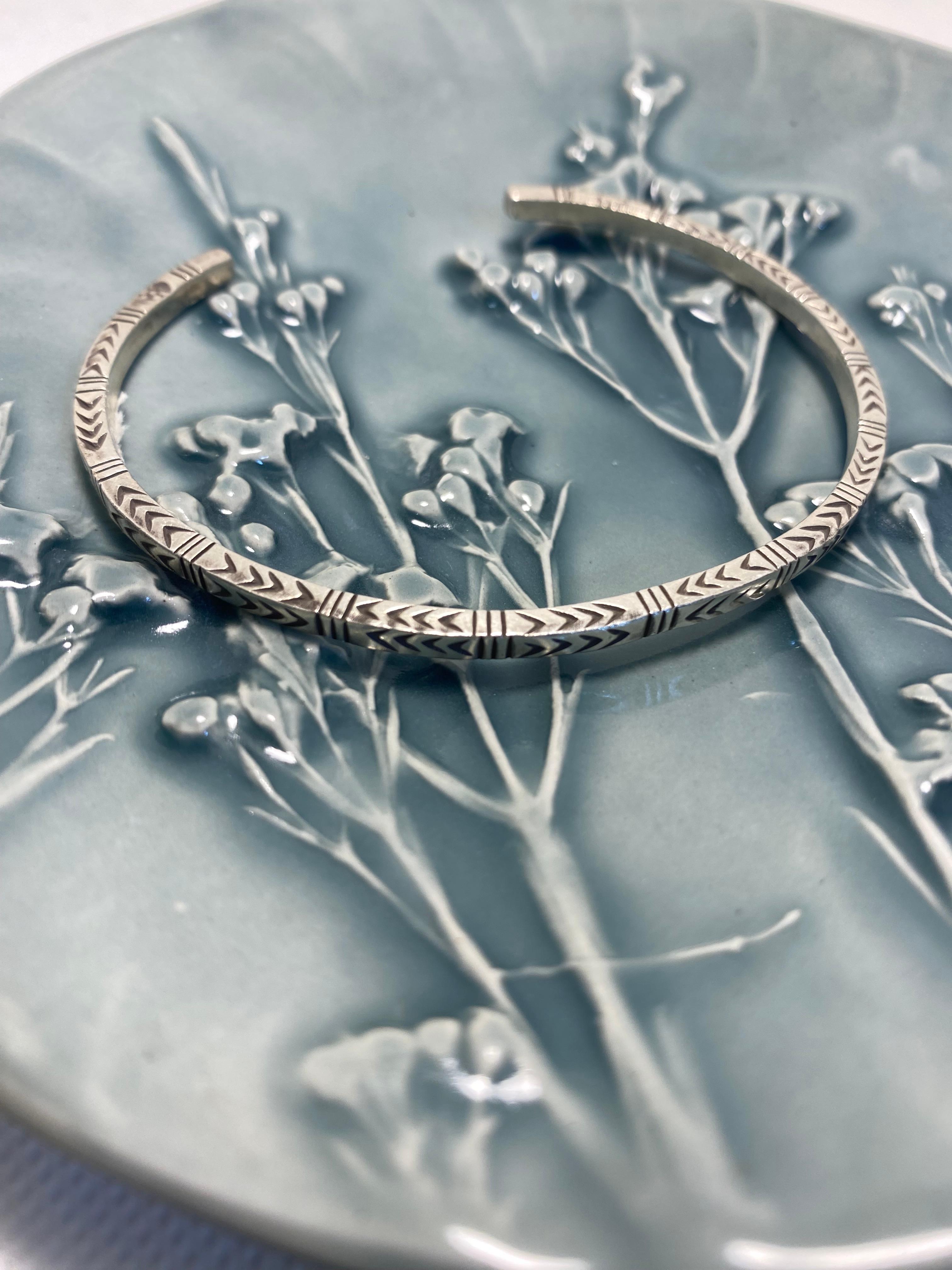 Punched tribal Bangle