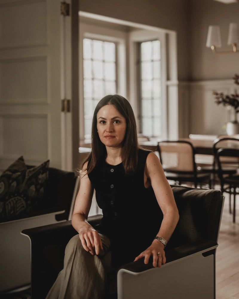 Portrait of Morgan Kelly seated in a client's home