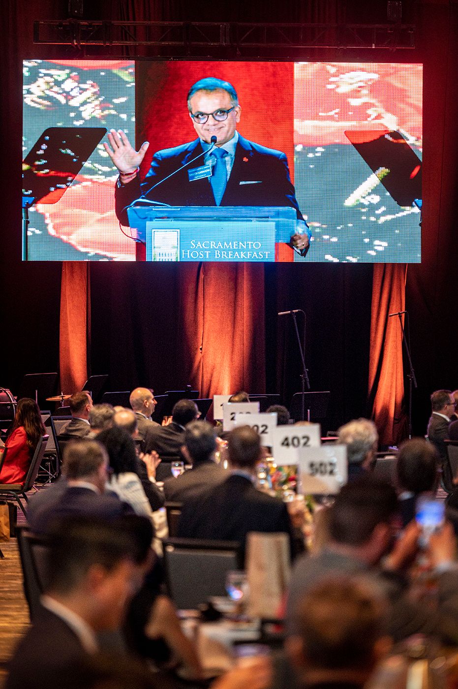 Kailesh Karavadra speaks at the Host Breakfast on June 2