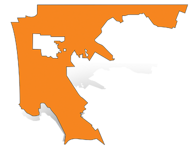 Orange silhouette map of Daly City with a gray drop shadow.