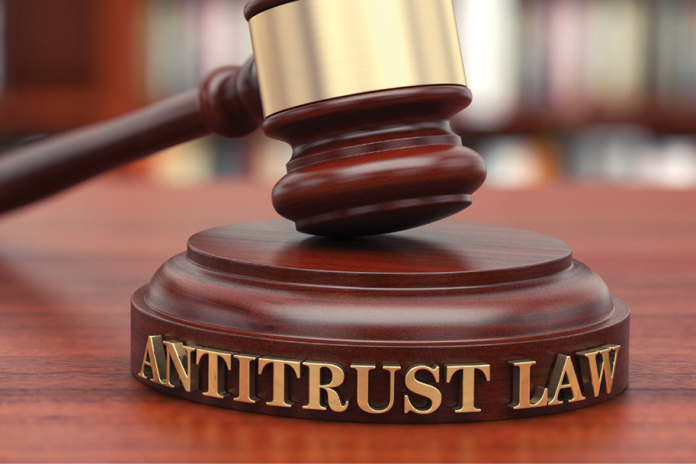 A wooden gavel above a sound block labeled Antitrust Law.