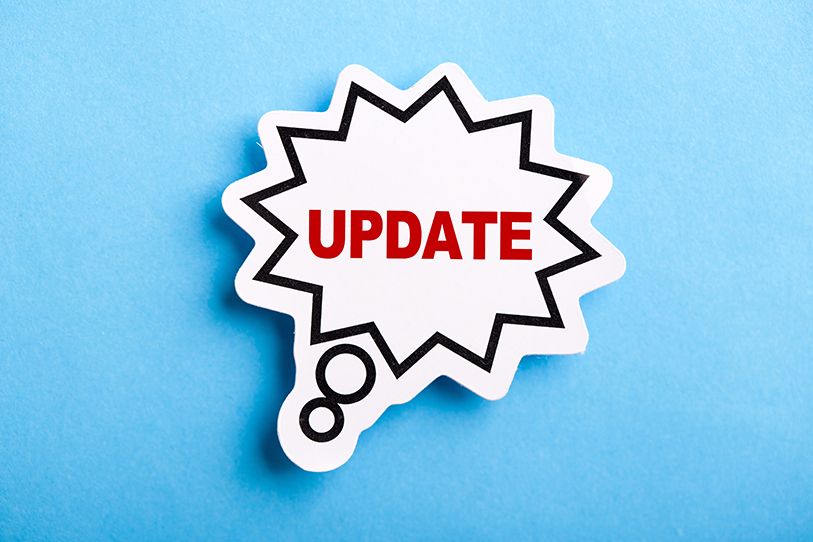 A white comic-style burst with red UPDATE text on a blue background.