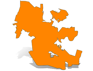 Orange silhouette map of Novato with a gray drop shadow.