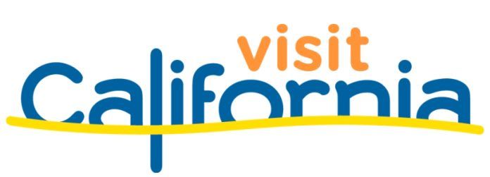 Visit California logo in blue and orange with a yellow underline.