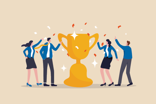 Illustration of four businesspeople celebrating around a large gold trophy with confetti.