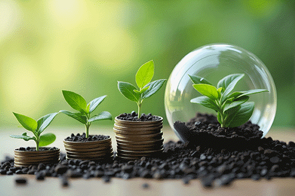 Green seedlings grow from ascending coin stacks beside a glass globe on dark soil.