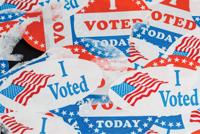 A pile of red, white and blue I Voted and Voted Today stickers.