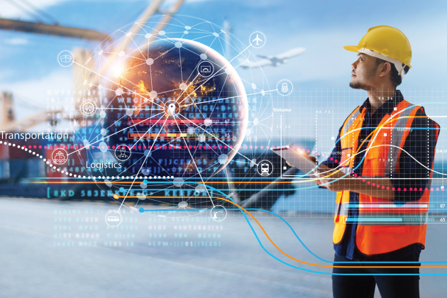 A port worker with a tablet stands beside a digital globe and connected logistics icons.