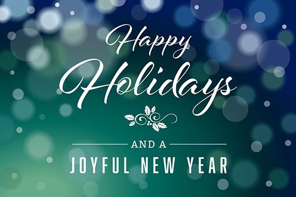 Happy Holidays and a Joyful New Year greeting over a blue and green background of glowing circles.