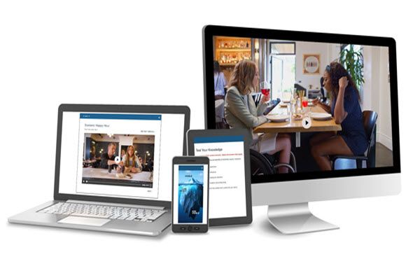 A desktop monitor, laptop, tablet and smartphone display online training content.