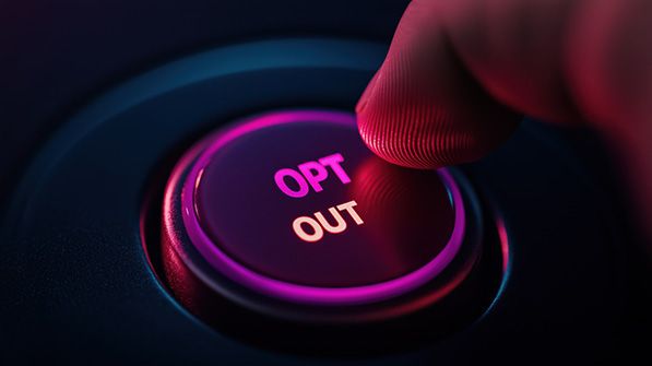 A finger presses a purple illuminated button labeled OPT OUT.