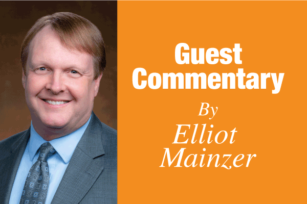 Portrait of a man beside an orange panel reading 'Guest Commentary By Elliot Mainzer.'