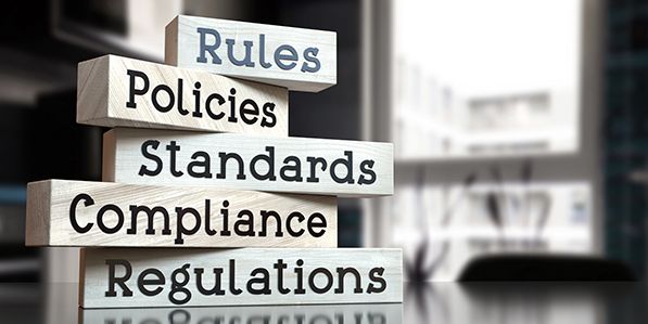 Stacked blocks labeled Rules, Policies, Standards, Compliance and Regulations.
