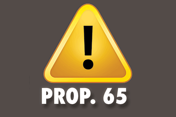 A yellow triangular warning sign with an exclamation mark above Prop. 65 lettering.