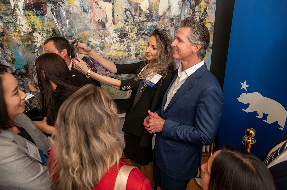 Romania Consul General Lucia Sava and Governor Newsom.