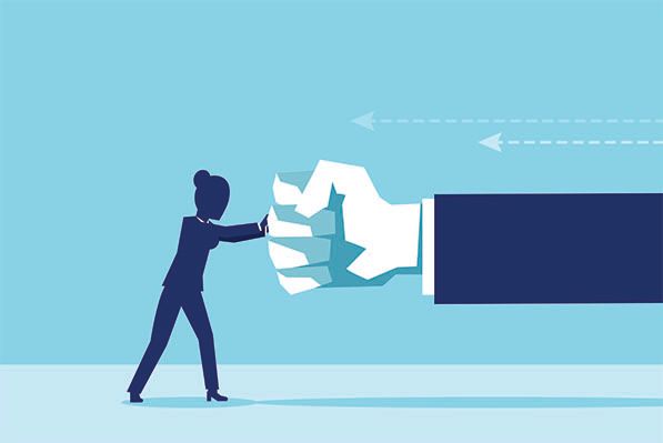 A person pushes against an oversized fist in a blue-toned illustration.
