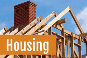Housing lettering overlays a photo of timber roof framing and a brick chimney.