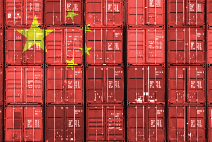 Red shipping containers form a Chinese flag with yellow stars.