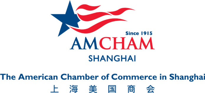 AmCham Shanghai logo with a blue star, red stripes and the words The American Chamber of Commerce in Shanghai.