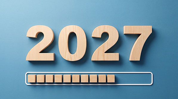 Wooden numbers "2027" above a progress bar that is mostly filled.