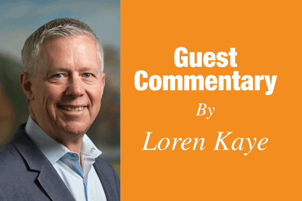 Portrait of a gray-haired man beside an orange panel reading 'Guest Commentary By Loren Kaye.'