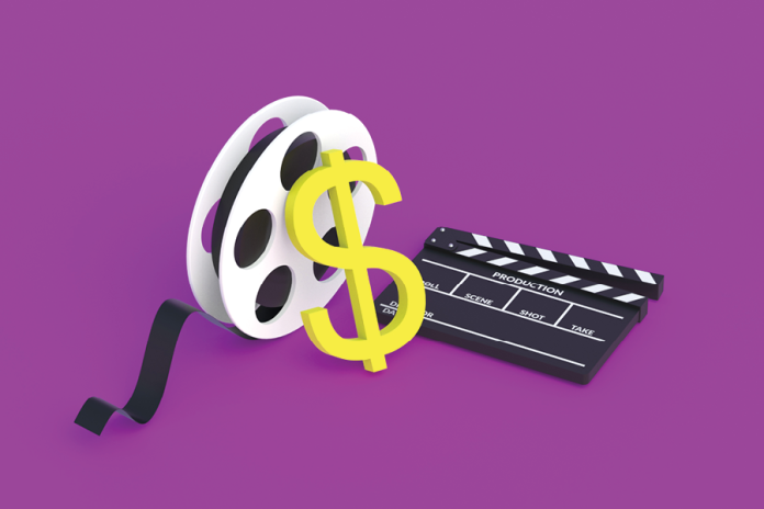 A film reel, yellow dollar sign and clapperboard on a purple background.