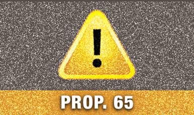 A yellow triangular warning symbol above a band labeled PROP. 65.