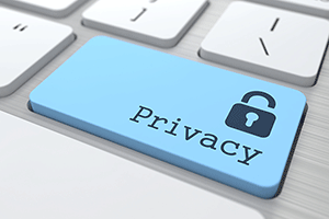 A blue Privacy keyboard key with a padlock symbol.