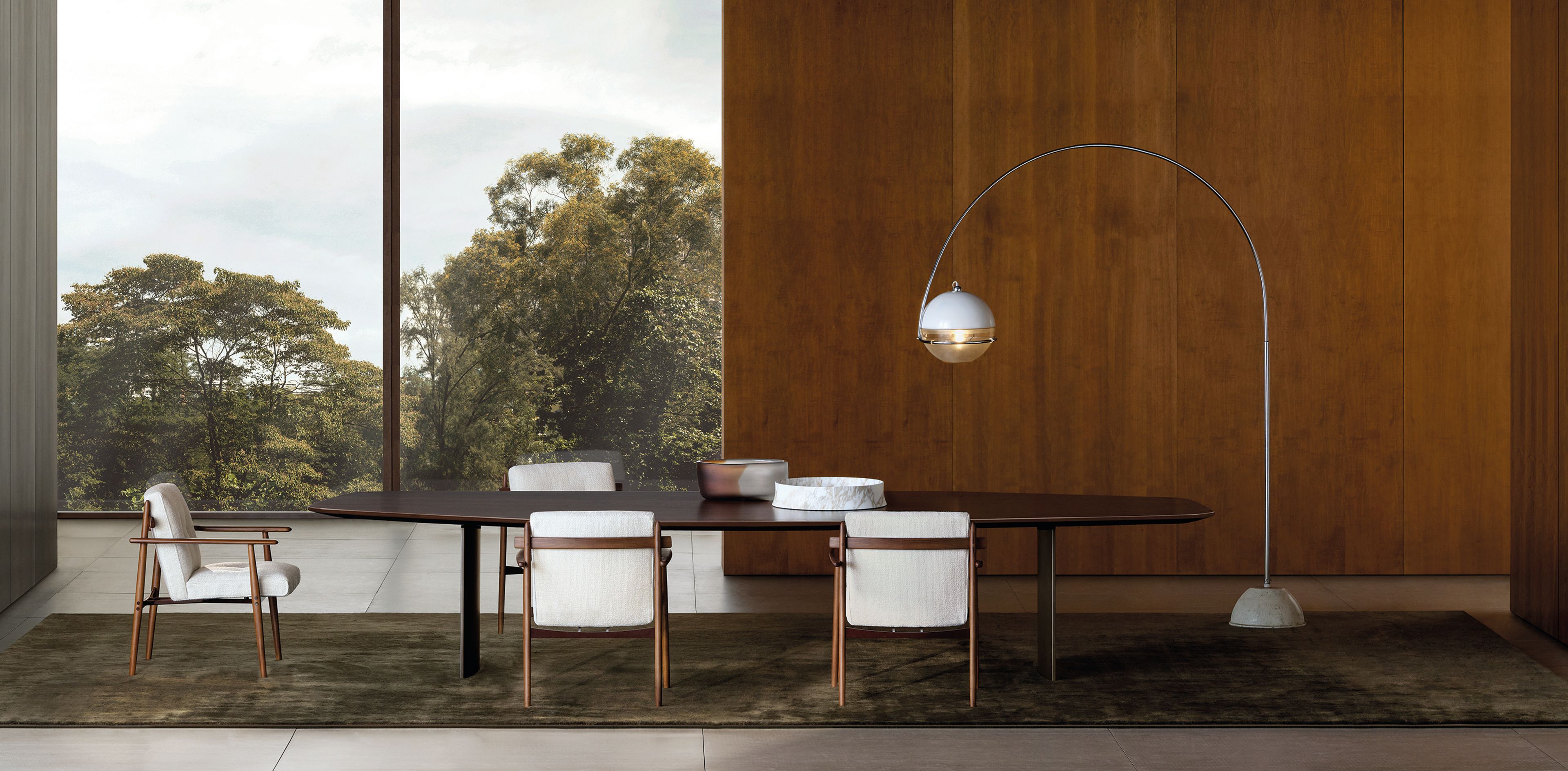 Dining table of a dynamic polygonal form by Minotti.