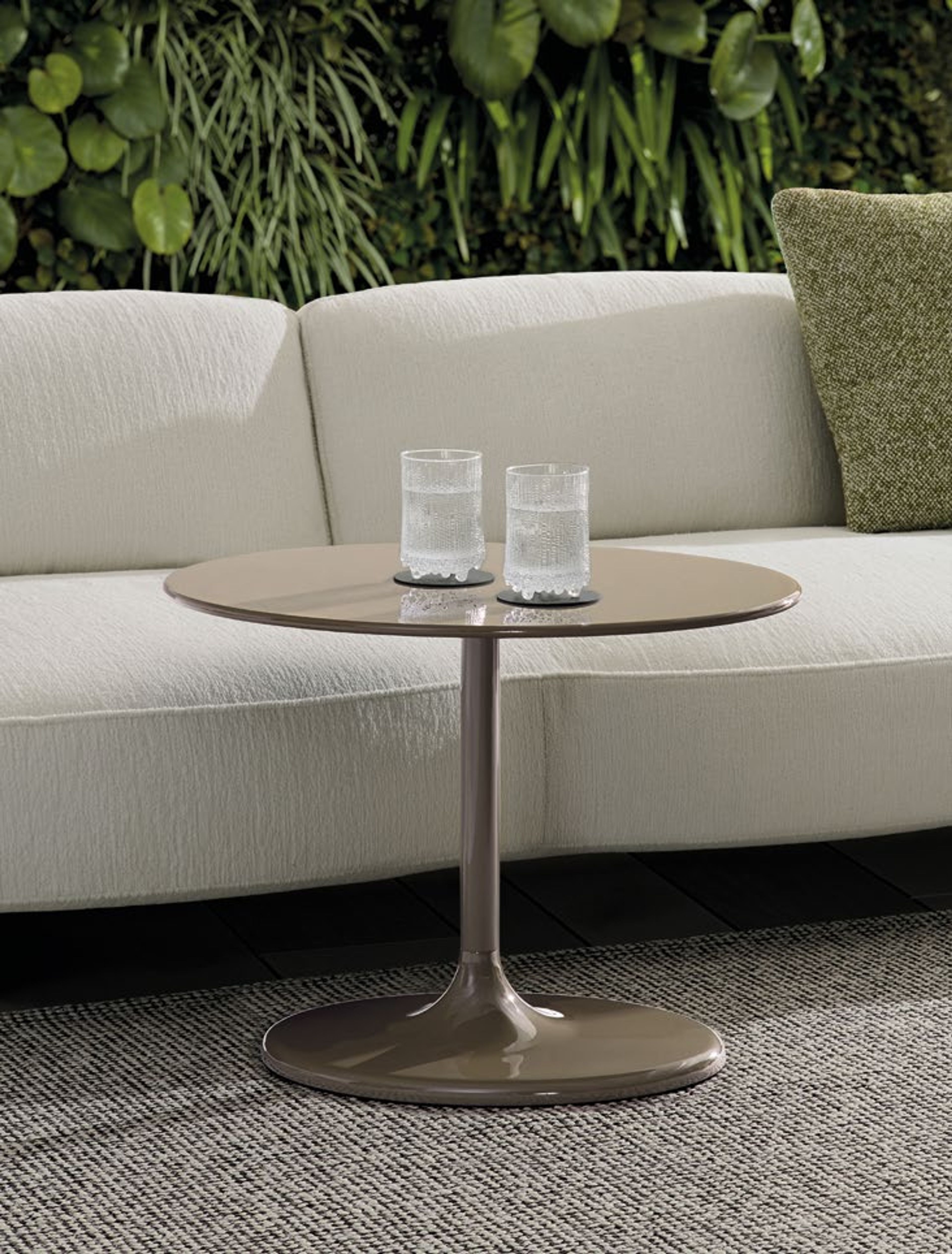 The oval top Minotti Outdoor coffee table.
