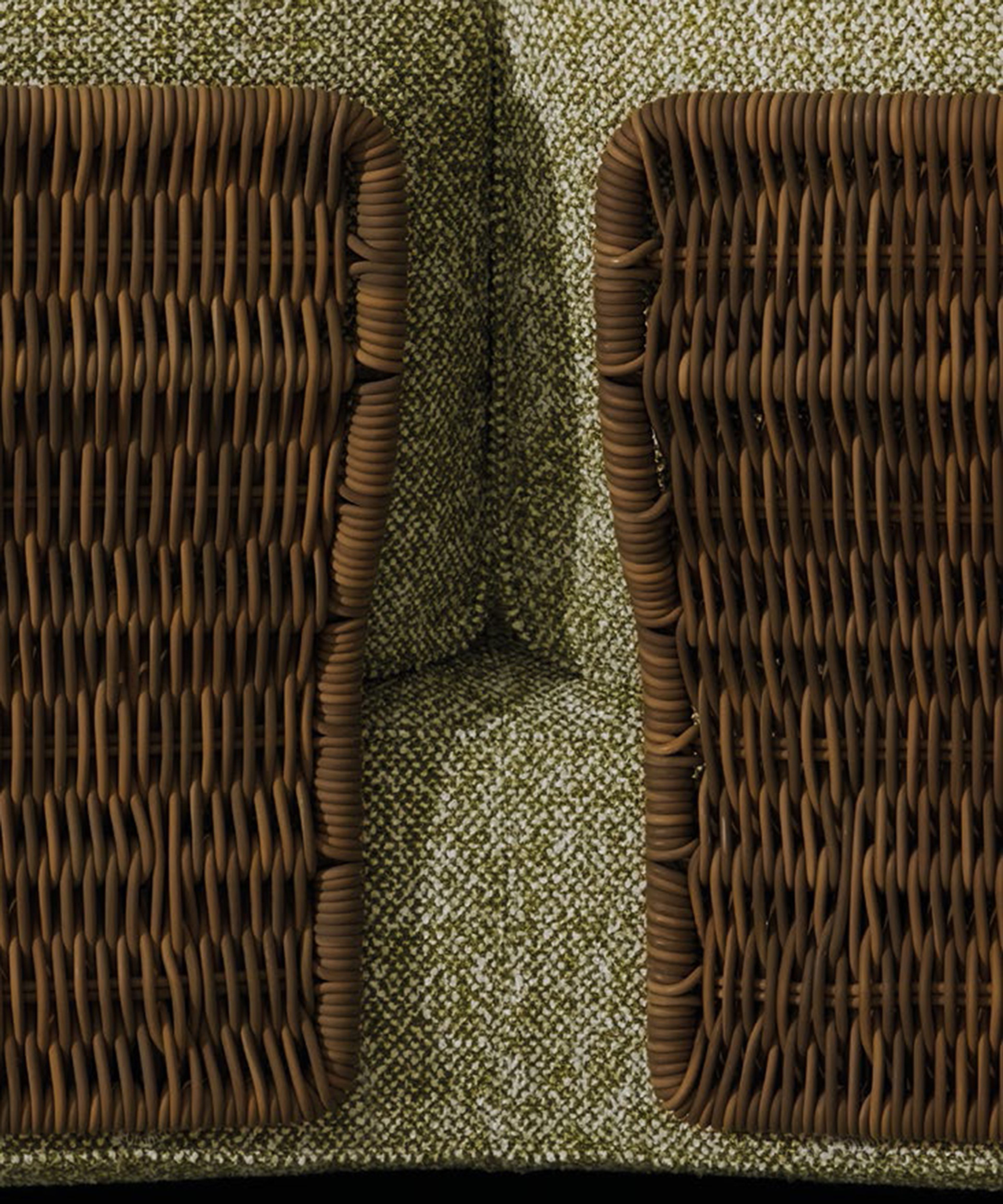 The Saki Cord Outdoor sofa combines sinuous panels with a woven cord structure.