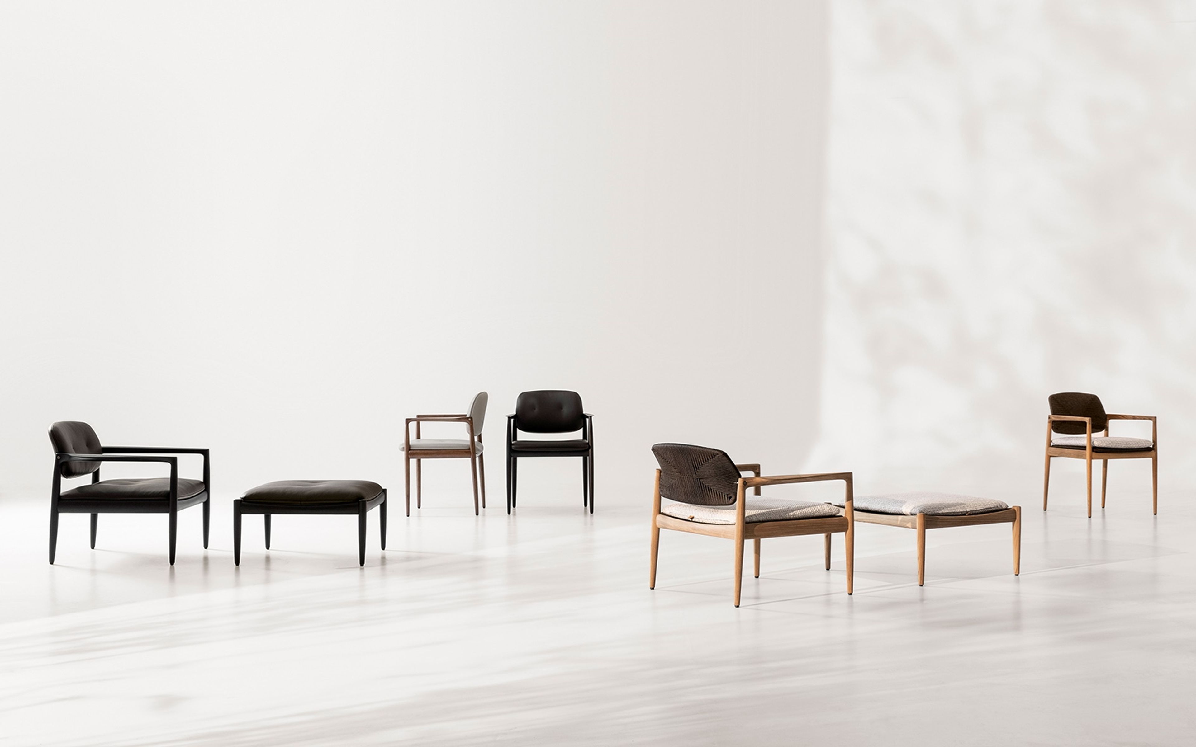 A light and elegant dining little armchair by Minotti.