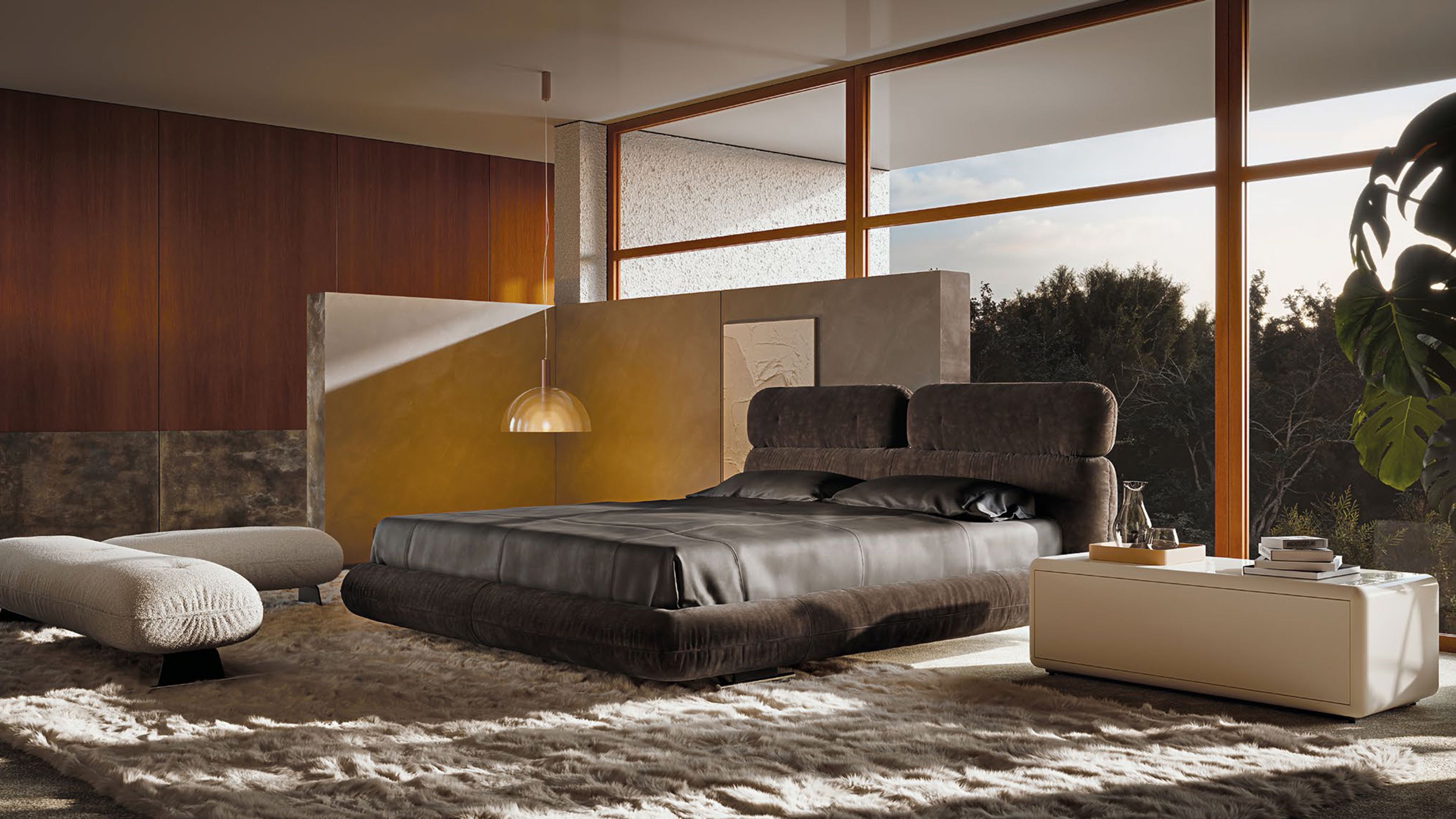 Le lit Libra de Minotti se caractérise par des volumes arrondis superposés.